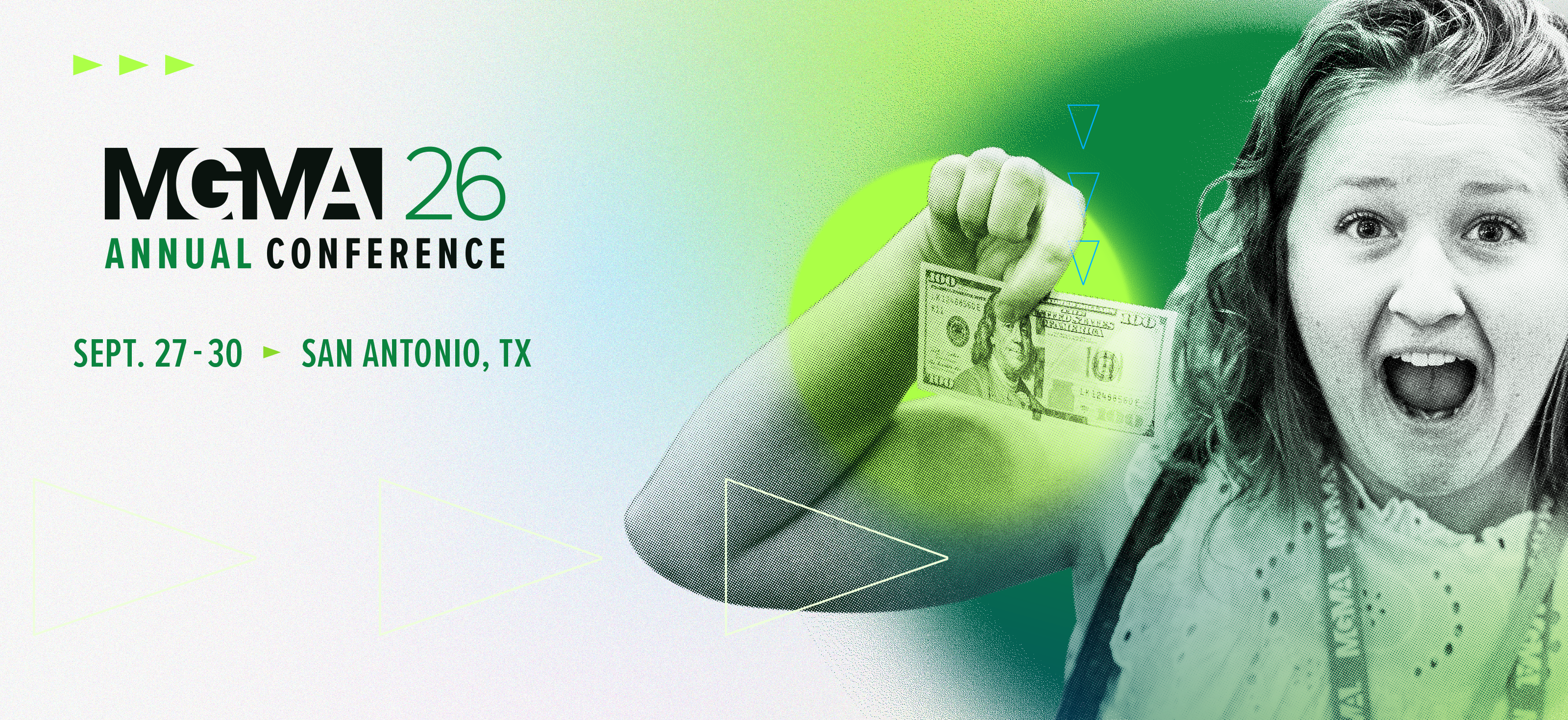 A woman holding a $100 bill