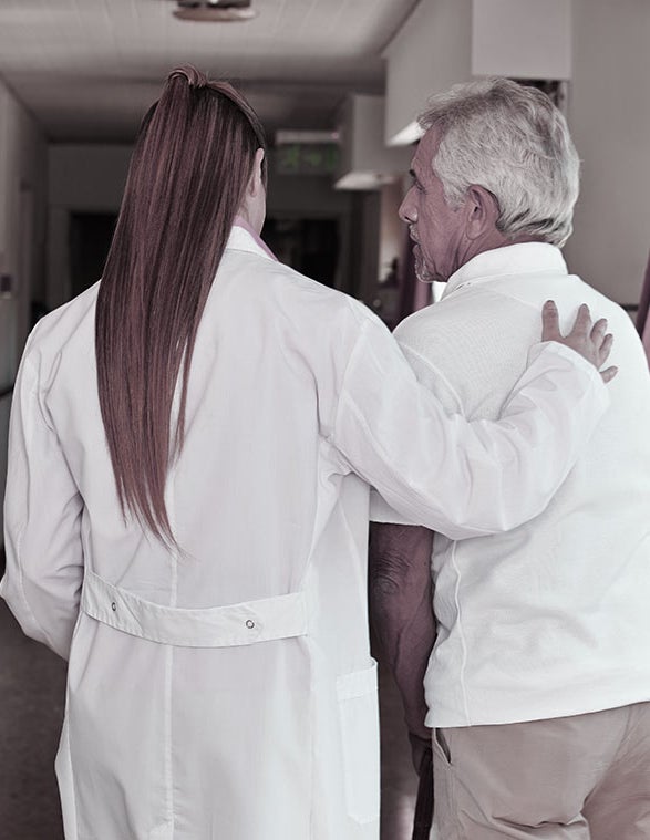 A doctor and a patient walk
